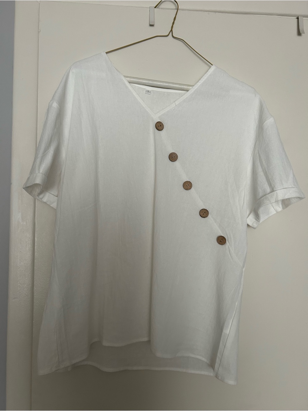 New never worn casual  White V-Neck Top with Diagonal Button Detail